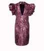 Pink sequin dress with ruffled sleeves on a white background