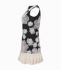 Black dress with floral patterns and white lace trim on a white background