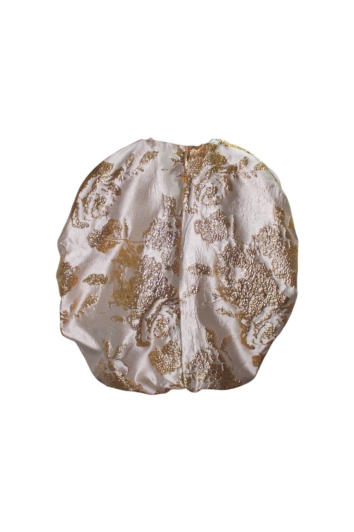 Gold textured jacquard blouse with relaxed silhouette and soft volume styled with sheer lace trousers on runway