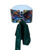 Colorful head wrap with a green ribbon on a white background
