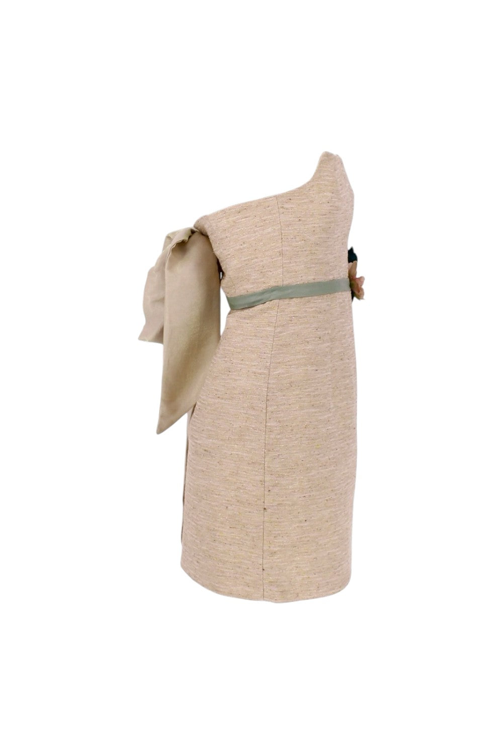 Beige one-shoulder dress with a green accent on a white background