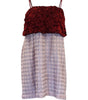 Dress with a red top and patterned skirt on a white background
