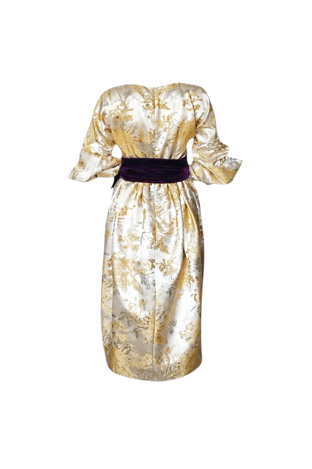 Gold floral dress with a purple belt on a white background