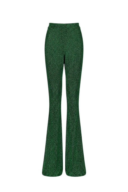 Green flared pants on a white background