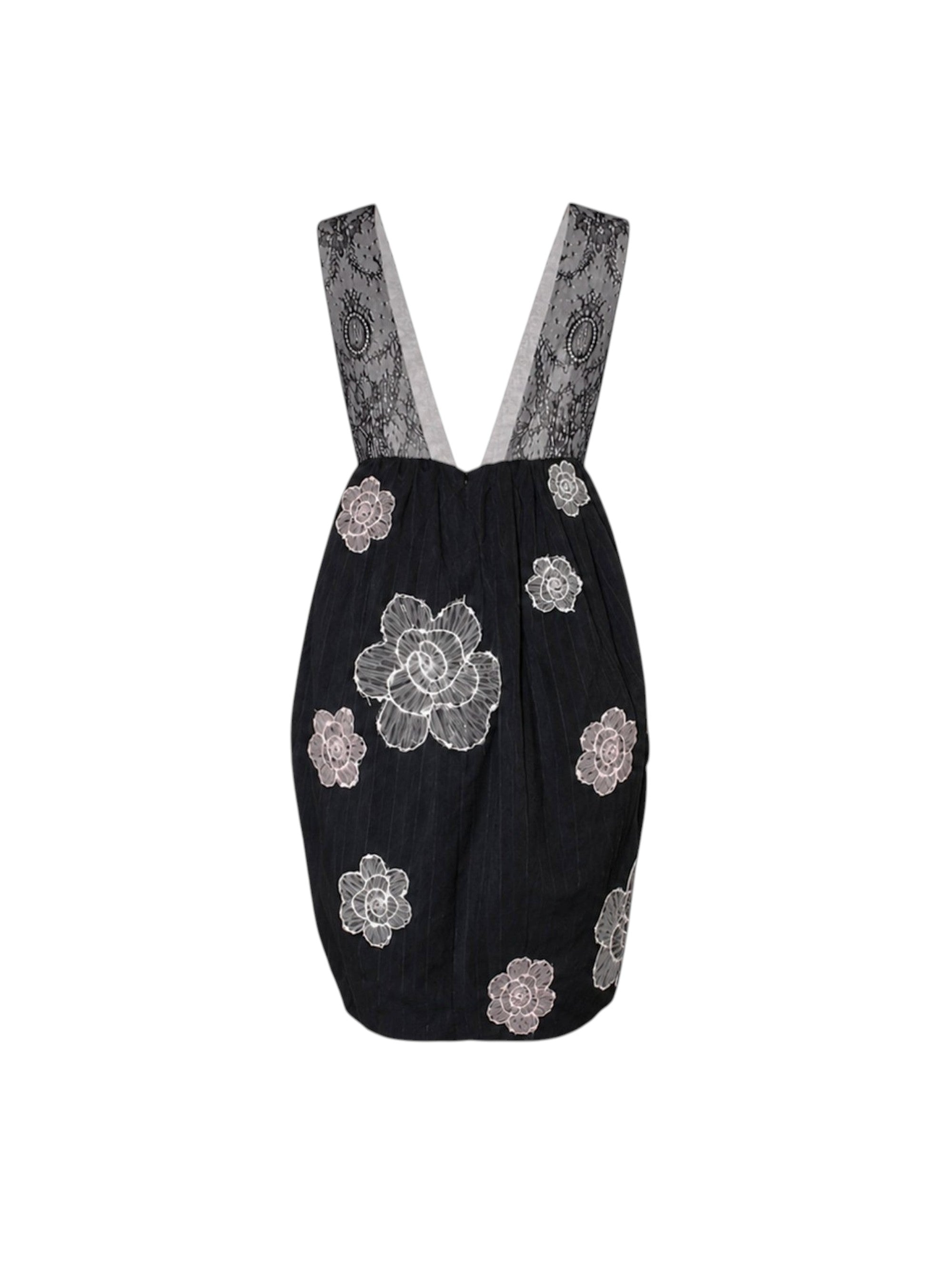 Black dress with floral lace patterns on a white background