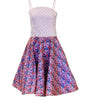Dress with floral skirt and lace top on a white background