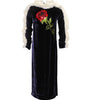 Black velvet dress with floral embroidery on a white background