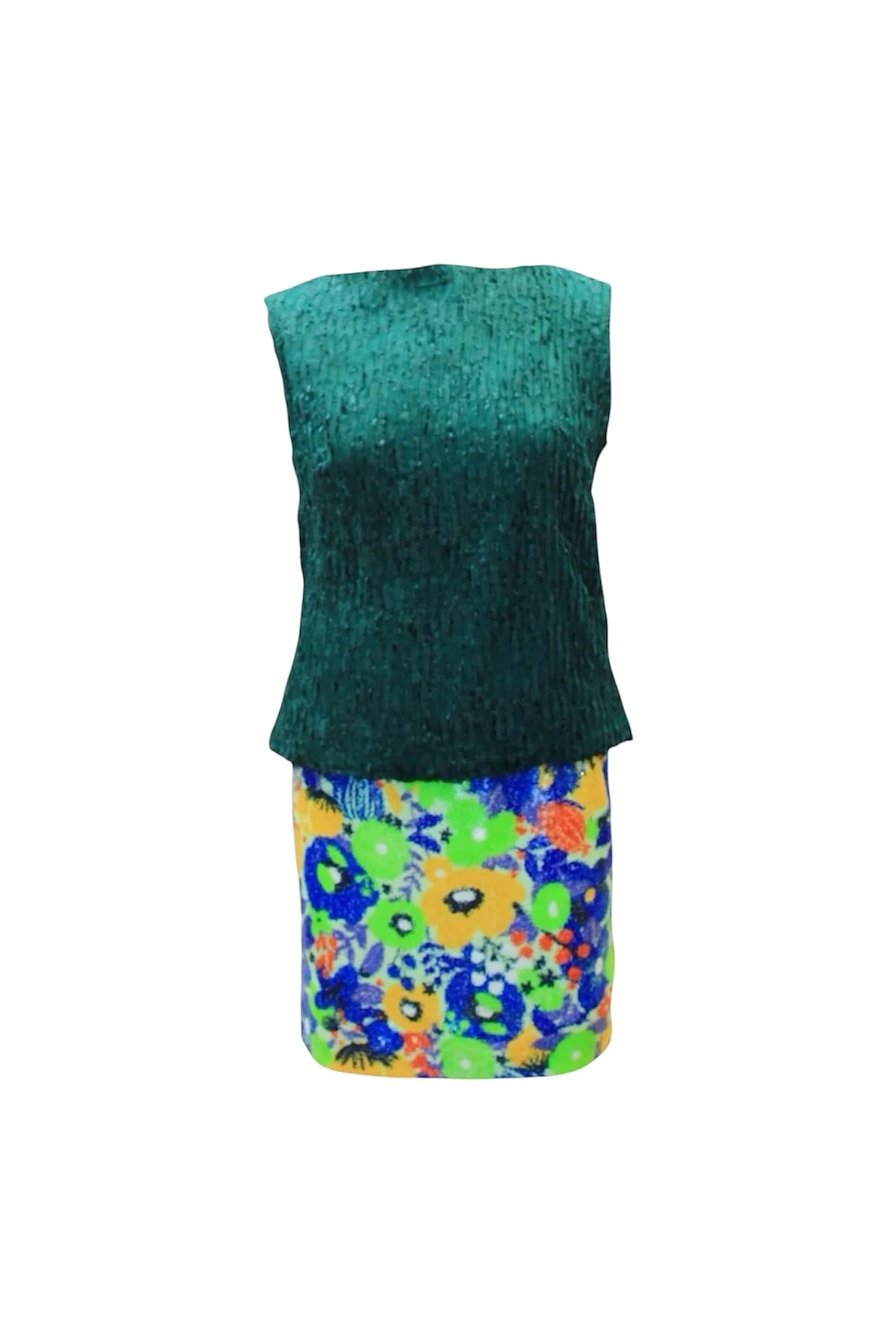 Green sleeveless top and colorful floral skirt on a white background