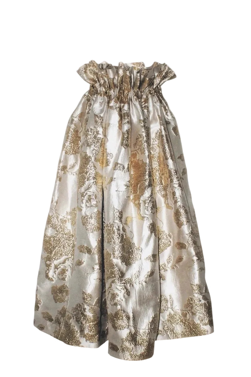 Gold and silver floral patterned dress on a white background