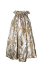 Gold and silver floral patterned dress on a white background
