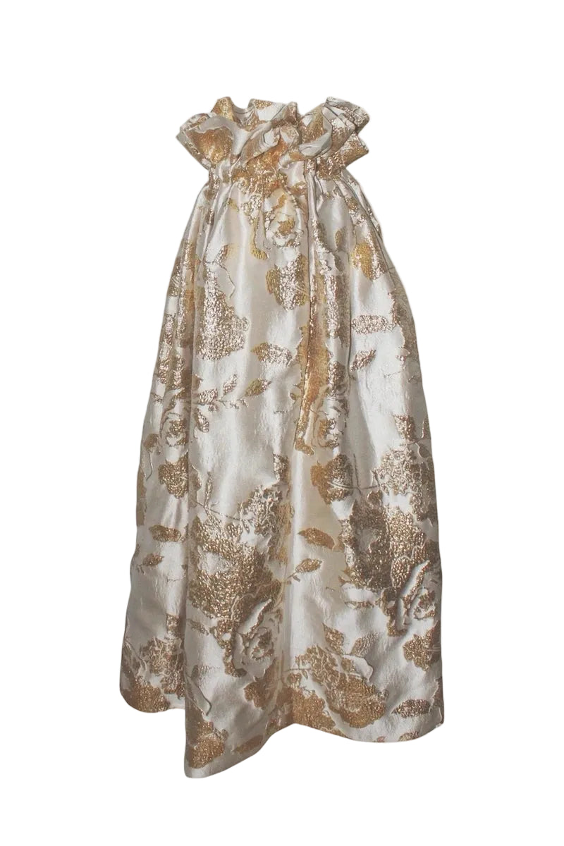 Gold and white floral dress on a white background