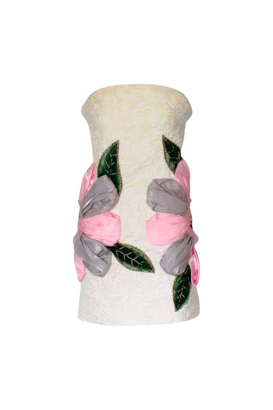 Decorative vase with pink and gray floral patterns on a white background