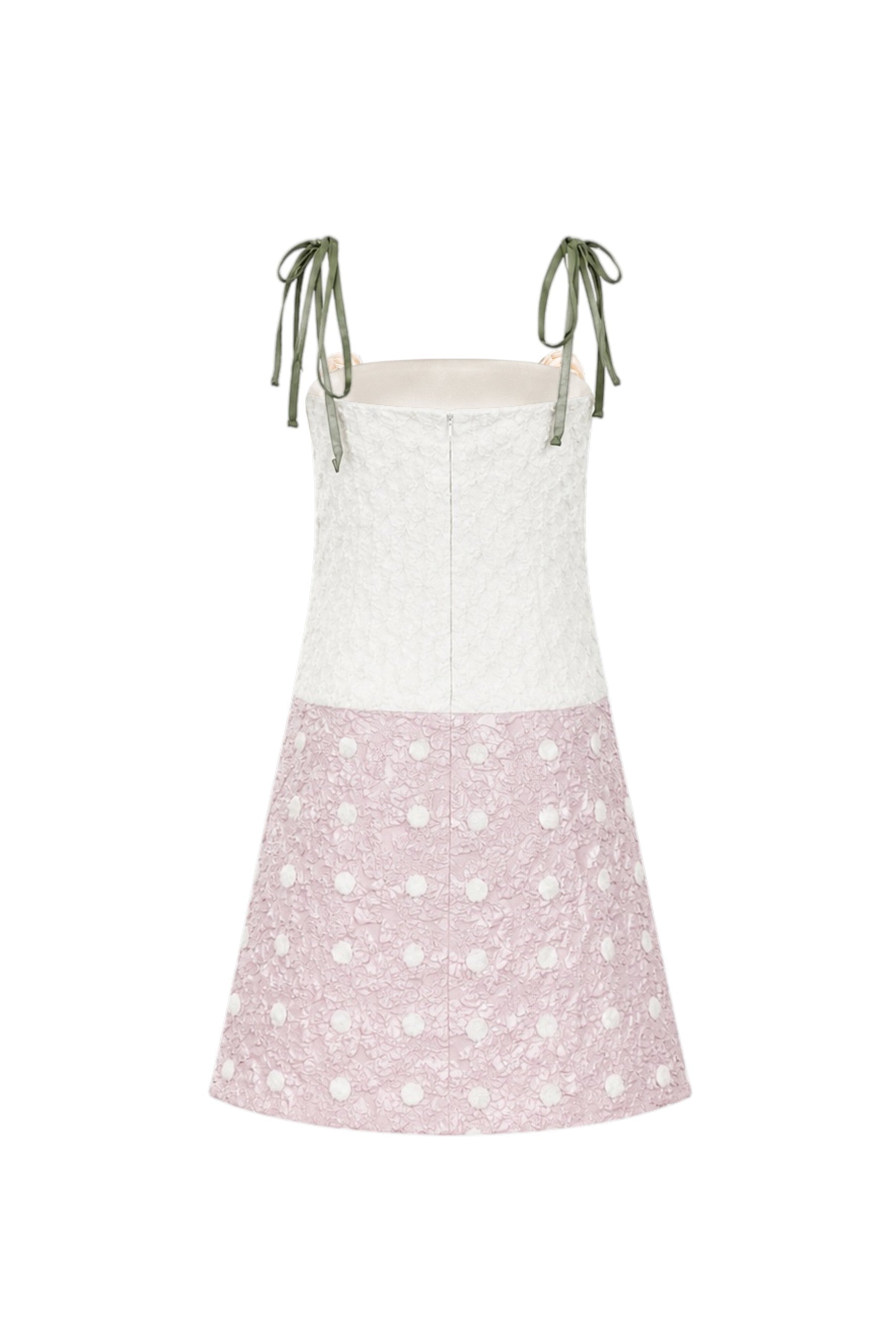 Dress with white top and pink polka dot skirt on a white background