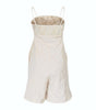 Beige romper with thin straps on a white background