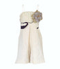 White strapless dress with floral details on a white background