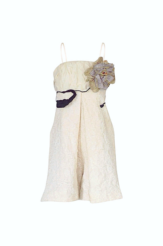 White strapless dress with floral details on a white background
