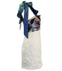 White lace dress with floral patterned top and blue ribbon on a white background
