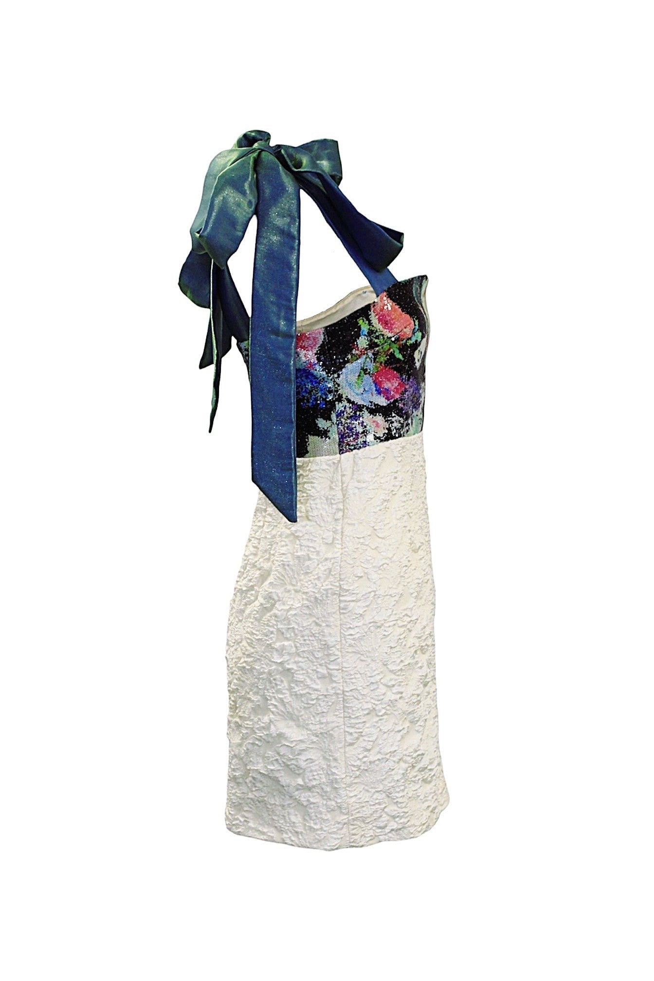 White lace dress with floral patterned top and blue ribbon on a white background