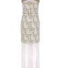 Long dress with textured bodice and sheer skirt on a white background
