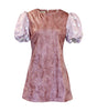 Pink velvet dress with puff sleeves on a white background