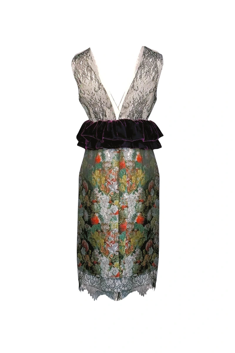 Dress with floral pattern and lace details on a white background