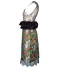Dress with floral pattern and ruffled hem on a white background