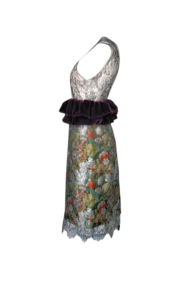 Dress with floral pattern and ruffled hem on a white background