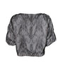 Black lace top on a white background