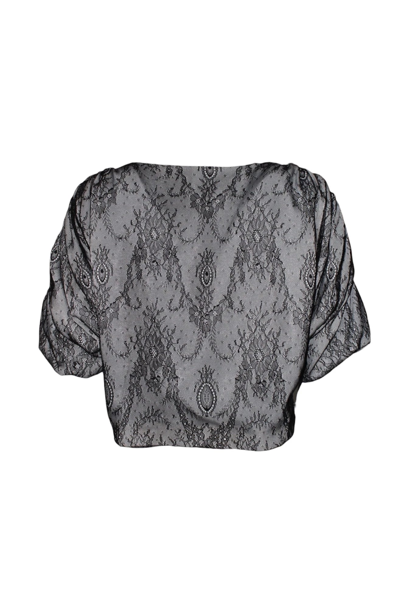 Black lace top on a white background