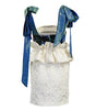 White lace dress with blue suspenders on a white background
