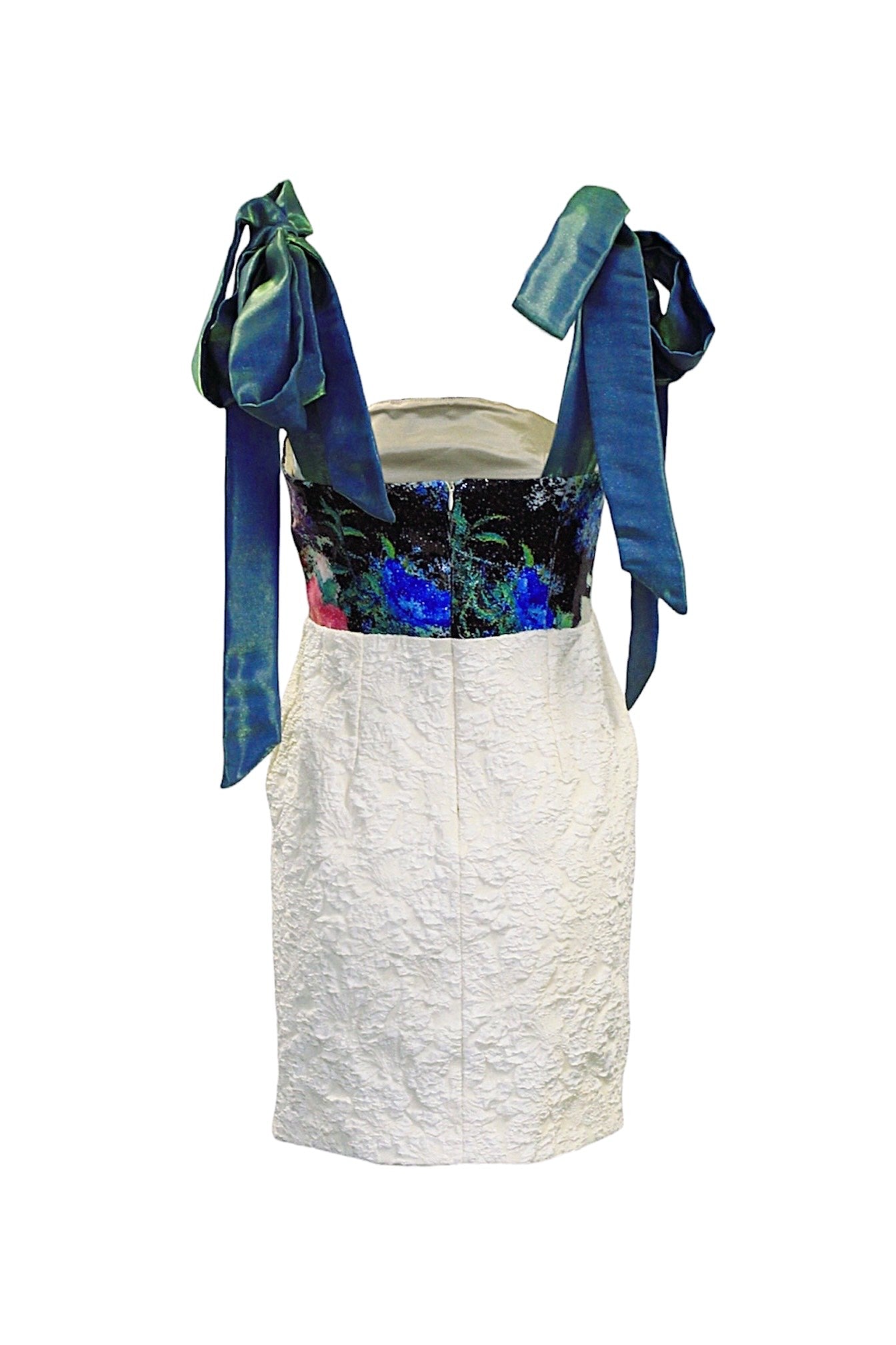 White paper bag with blue ribbons and a colorful label on a white background