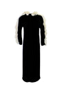 Black dress with white lace trim on a white background