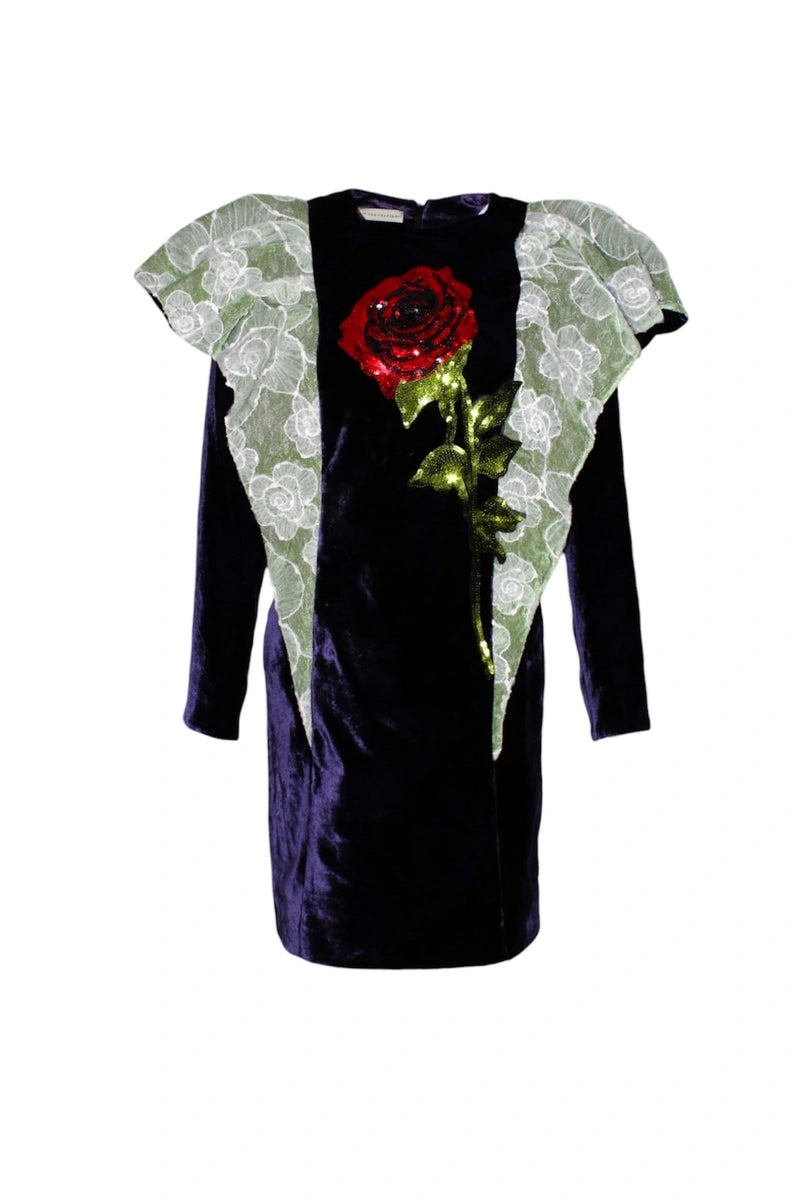 Black dress with floral sleeves and roses on a white background