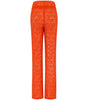 Orange pants with a subtle pattern on a white background