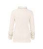 Cream-colored ribbed sweater on a white background