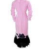 Pink dress with black floral hem on a white background