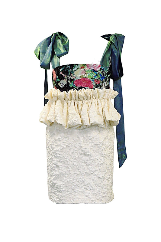 Dress with floral top and ruffled skirt on a white background