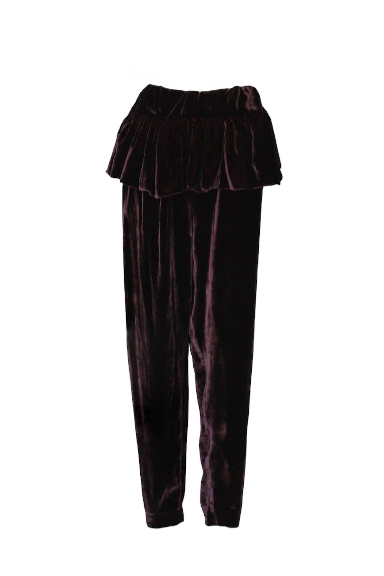 Pair of dark purple velvet pants with a ruffled top on a white background