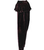 Black velvet pants with a ruffled top on a white background