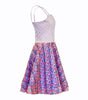 Dress with floral skirt and white top on a white background
