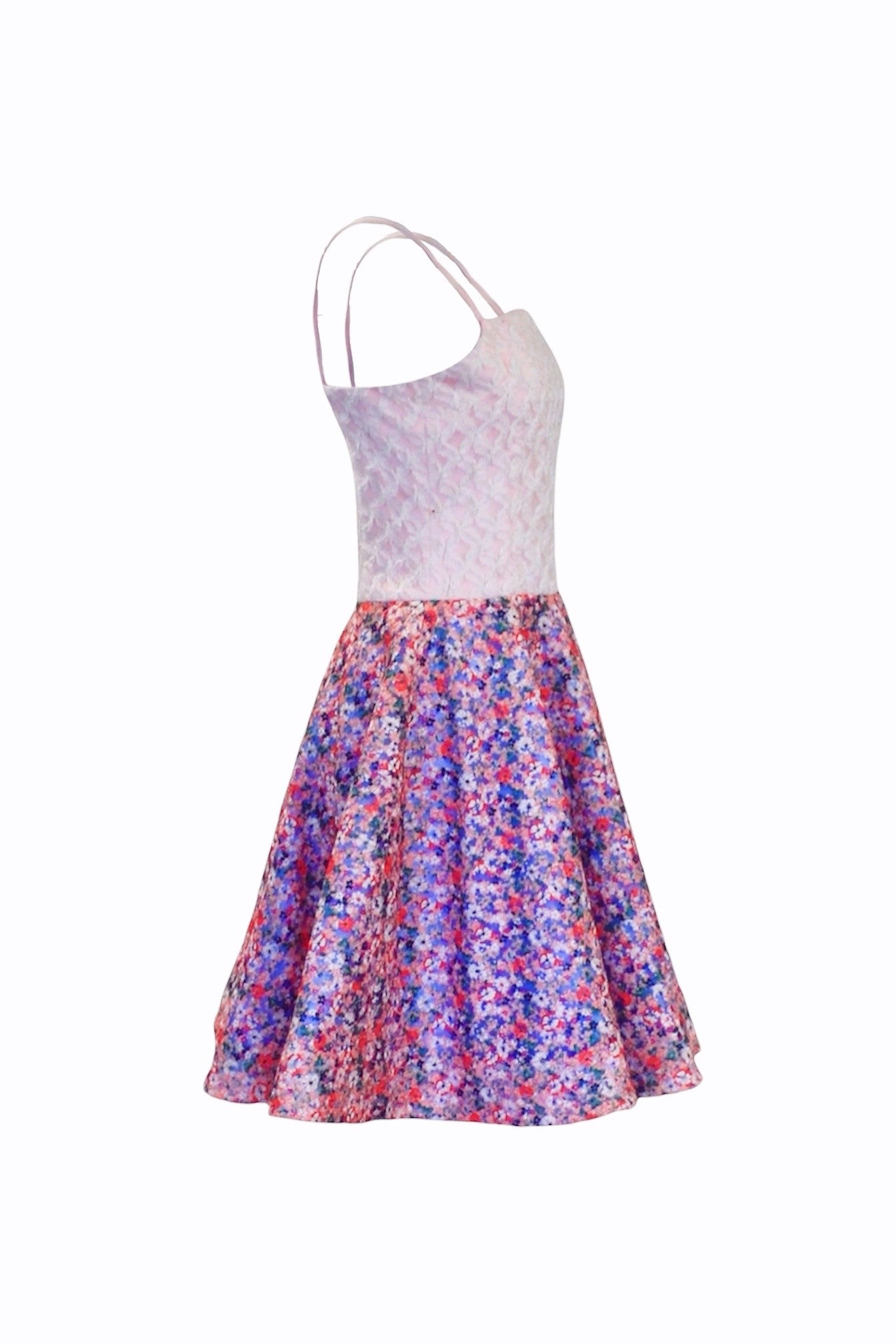 Dress with floral skirt and white top on a white background