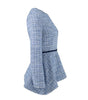Blue knitted off-shoulder sweater on a white background