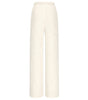White textured pants on a white background