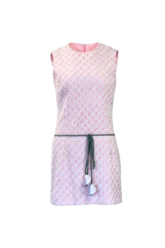 White apron with pink floral pattern on a white background